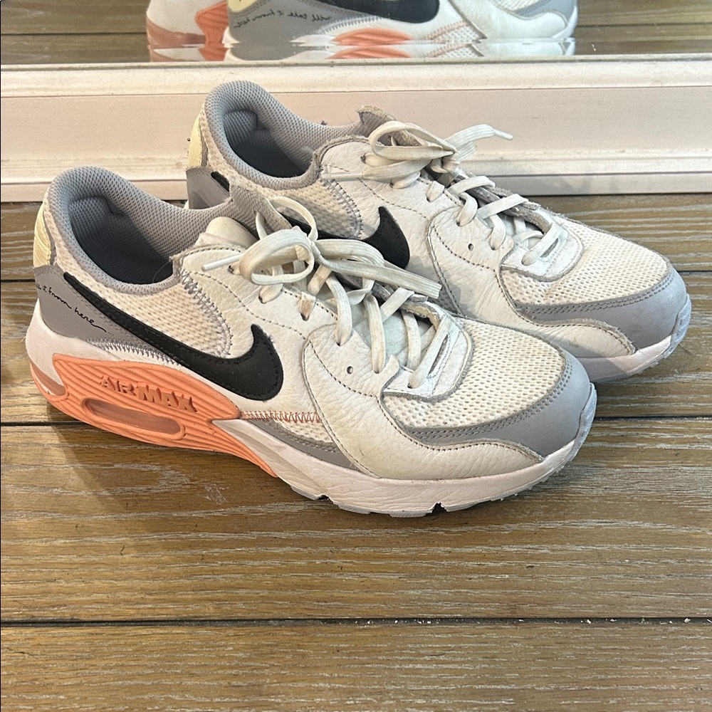 Nike White Gray Sneakers with Black Swoosh and Peach Accent